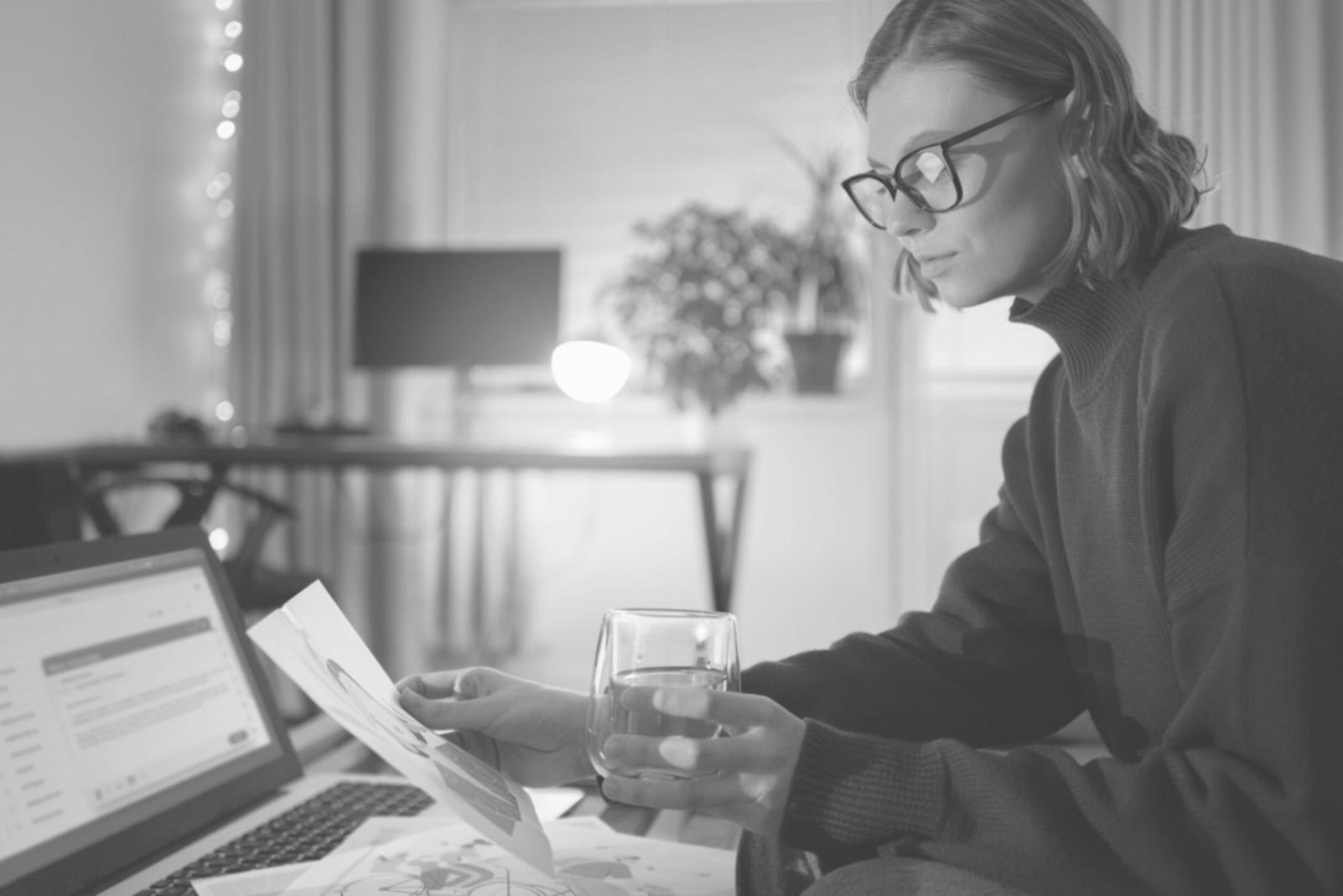 Professional analyzing financial statements and reports